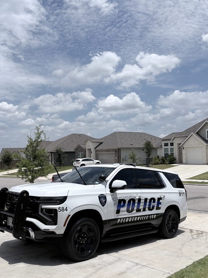 Pflugerville ISD police Chevy Tahoe freshly detailed in a driveway
