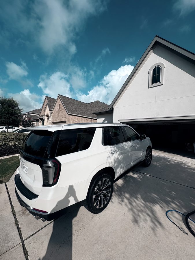 White Chevy Tahoe with a deep gloss finish after an exterior detail