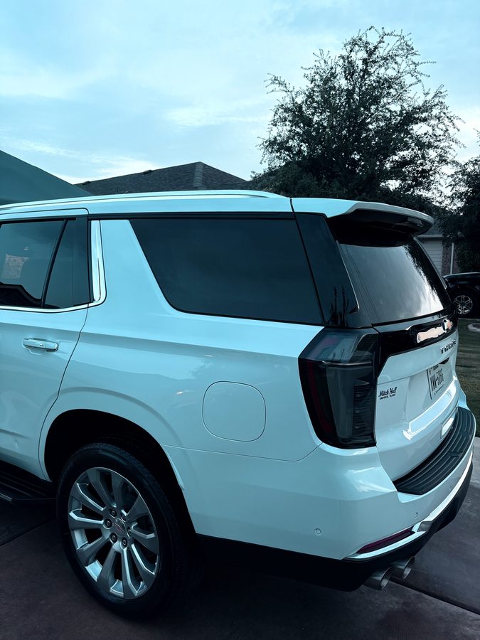 White Chevrolet Tahoe with a fresh gloss finish after an exterior detail